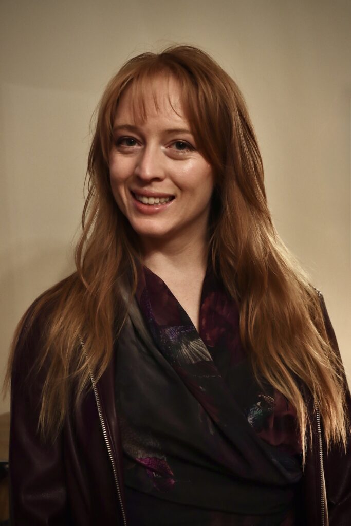 Headshot of Olivia Harding, nationally touring folk musician and host of Folk Files, a free folk music history podcast